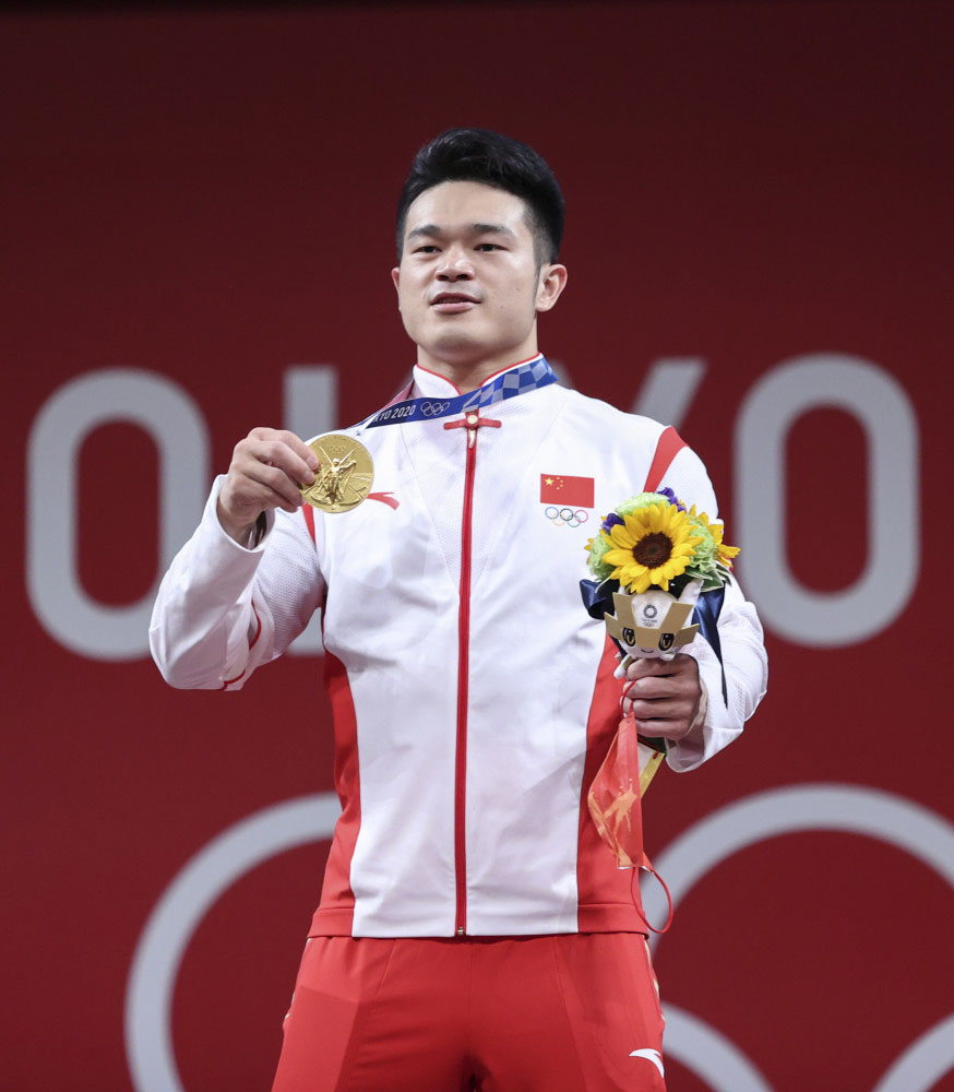 奥运举重石智勇视频_早期的奥运举重冠军石智勇_中国举重奥运冠军石智勇
